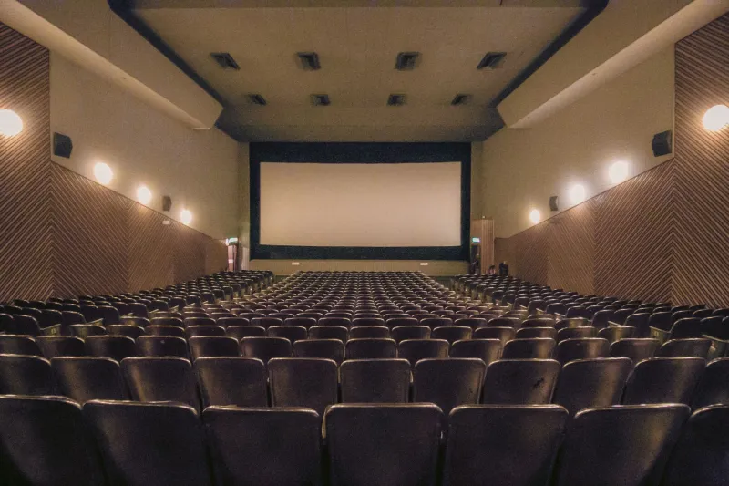 The Dark Was the Point: What We Gave Up When We Brought Our Phones Into the Theater